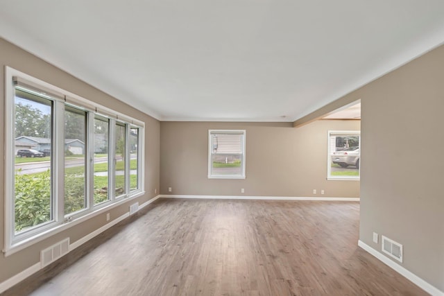 117 Division St, Mankato, MN 56001 - unfurnished room featuring wood finished floors and baseboards