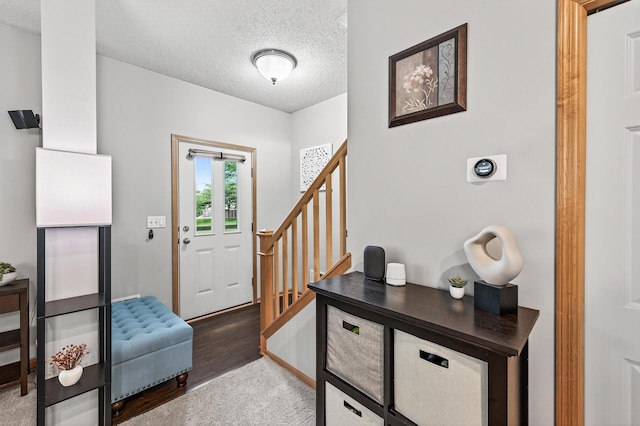 13433 Brick Path, Rosemount, MN 55068 - entryway with a textured ceiling, stairs, and wood finished floors