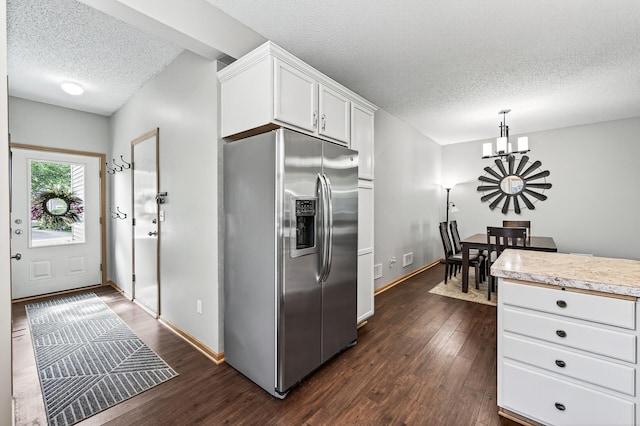 13433 Brick Path, Rosemount, MN 55068 - kitchen with stainless steel fridge with ice dispenser, a textured ceiling, a chandelier, dark wood-type flooring, and light countertops