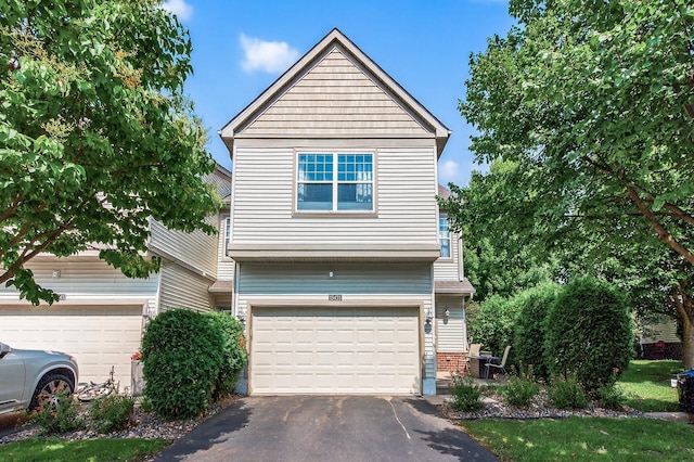 13433 Brick Path, Rosemount, MN 55068 - view of front facade with driveway, a garage, and brick siding