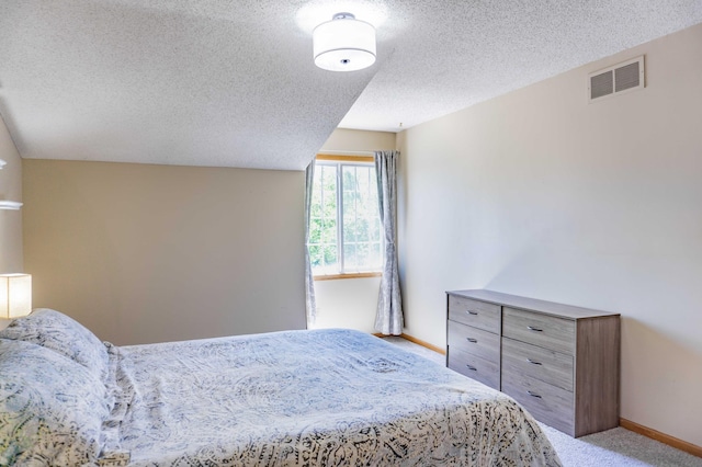 7639 Nicholas Way, Chanhassen, MN 55317 - bedroom featuring a textured ceiling and carpet floors