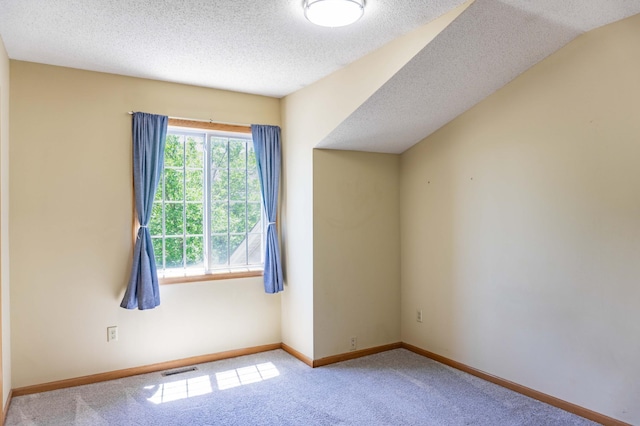 7639 Nicholas Way, Chanhassen, MN 55317 - unfurnished room with carpet flooring and a textured ceiling