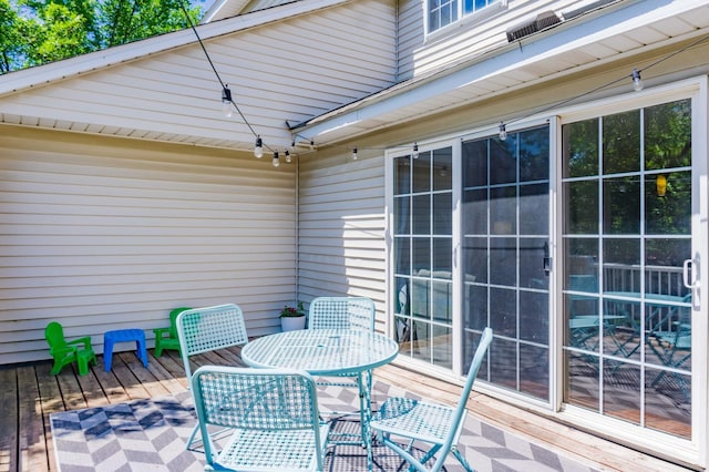 7639 Nicholas Way, Chanhassen, MN 55317 - wooden deck with outdoor dining area
