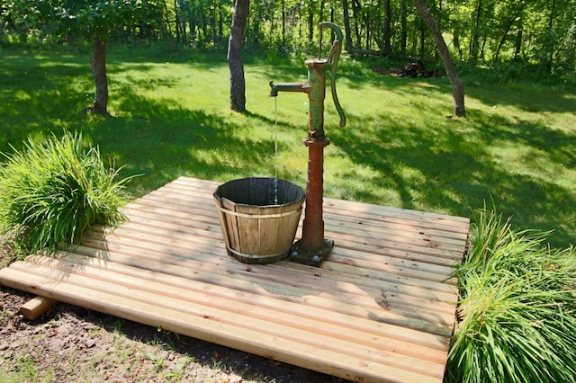 11715 Sorenson Lake Rd, Merrifield, MN 56465 - wooden terrace featuring a lawn