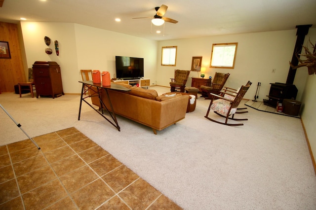 11715 Sorenson Lake Rd, Merrifield, MN 56465 - living area with carpet floors, a ceiling fan, a wood stove, and recessed lighting
