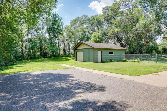 7771 Odean Ave NE, Otsego, MN 55330 - detached garage with view of scattered trees