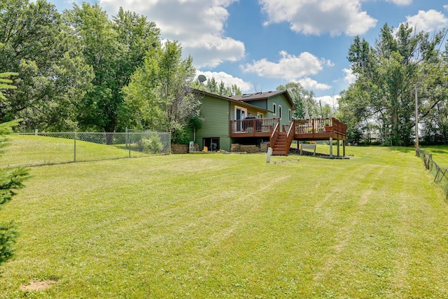 7771 Odean Ave NE, Otsego, MN 55330 - fenced backyard with a wooden deck
