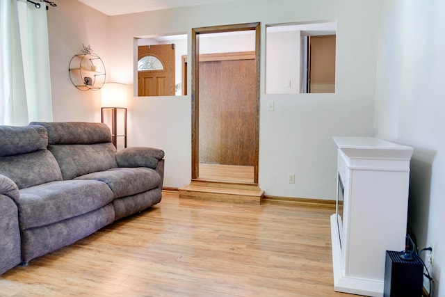 7771 Odean Ave NE, Otsego, MN 55330 - living room with light wood-style floors and baseboards