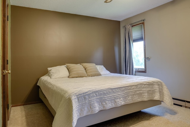 7771 Odean Ave NE, Otsego, MN 55330 - carpeted bedroom with baseboard heating and baseboards