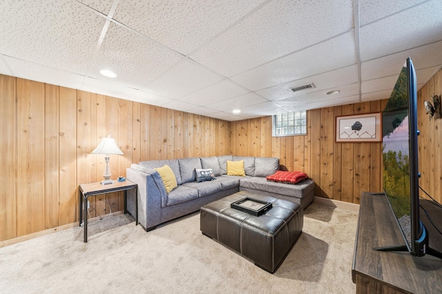 1073 Allen Ave W, Saint Paul, MN 55118 - living room with carpet floors, a drop ceiling, and wood walls