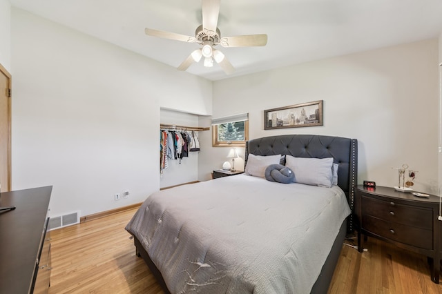 1073 Allen Ave W, Saint Paul, MN 55118 - bedroom featuring wood finished floors, a ceiling fan, and a closet