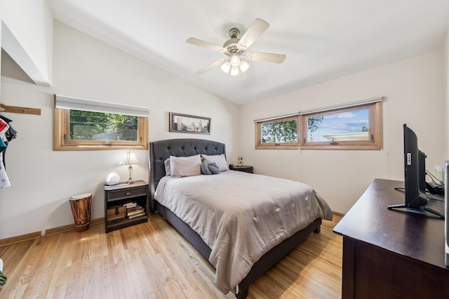 1073 Allen Ave W, Saint Paul, MN 55118 - bedroom with vaulted ceiling, multiple windows, light wood-type flooring, and ceiling fan