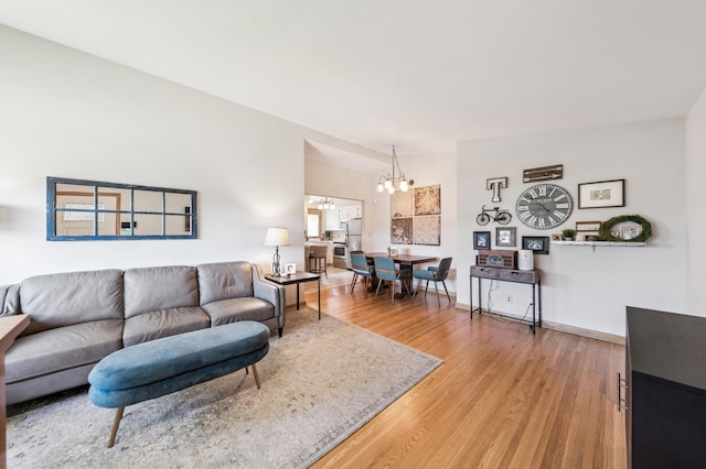 1073 Allen Ave W, Saint Paul, MN 55118 - living room featuring a chandelier and light wood-style floors