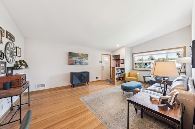 1073 Allen Ave W, Saint Paul, MN 55118 - living room featuring light wood-style flooring and lofted ceiling