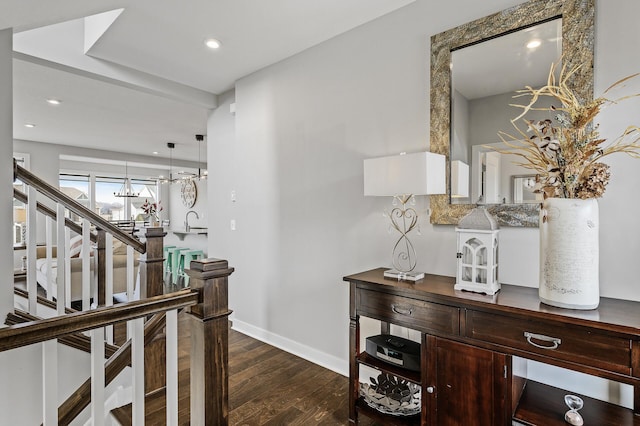 2301 Kester Ave NE, Saint Michael, MN 55376 - hallway with dark wood-style floors, recessed lighting, and a chandelier