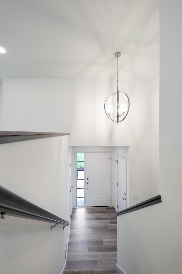 37554 Greenwich Ct, North Branch, MN 55056 - entryway with a chandelier, wood finished floors, and a high ceiling