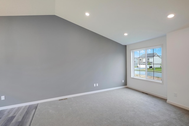 37554 Greenwich Ct, North Branch, MN 55056 - carpeted spare room featuring recessed lighting and vaulted ceiling