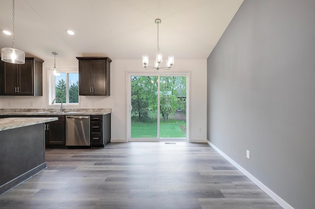 37554 Greenwich Ct, North Branch, MN 55056 - kitchen featuring dishwasher, dark brown cabinets, plenty of natural light, a chandelier, and recessed lighting