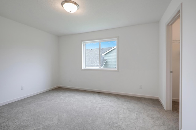 37554 Greenwich Ct, North Branch, MN 55056 - carpeted empty room with baseboards