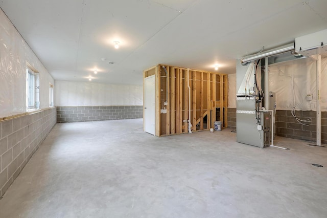 37554 Greenwich Ct, North Branch, MN 55056 - below grade area featuring concrete block wall and heating unit