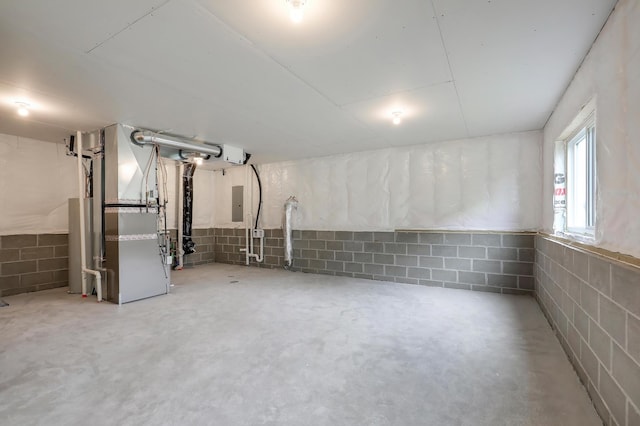 37554 Greenwich Ct, North Branch, MN 55056 - basement with heating unit, concrete block wall, and electric panel
