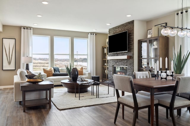 14500 106th Pl N, Maple Grove, MN 55369 - living area featuring wood finished floors, a fireplace, and recessed lighting