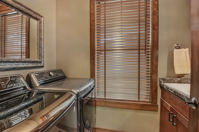 860 Prairie Meadows Dr, Hudson, WI 54016 - laundry area with separate washer and dryer and cabinet space