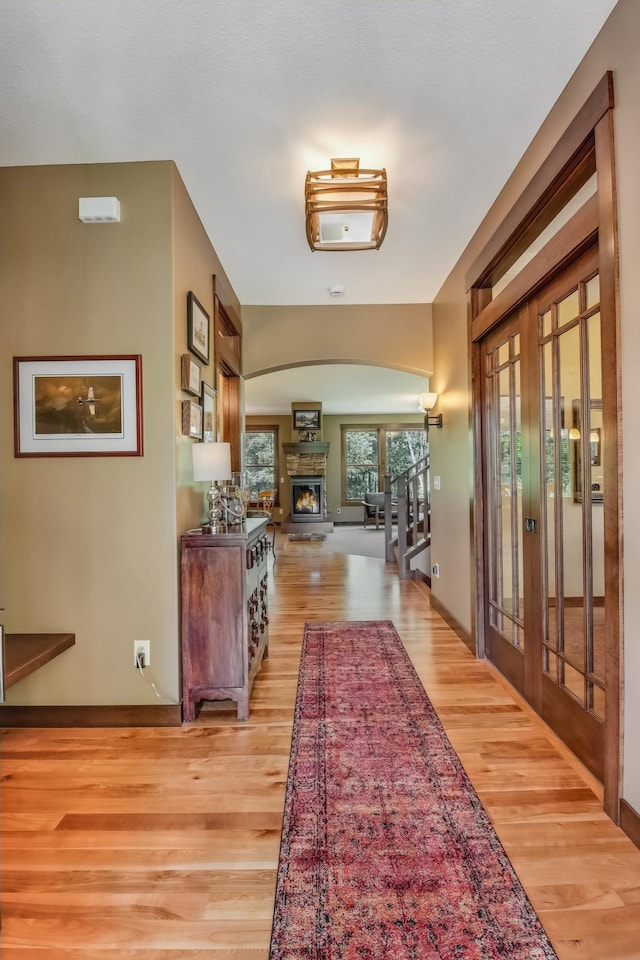 860 Prairie Meadows Dr, Hudson, WI 54016 - corridor featuring light wood-style floors and french doors