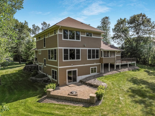 860 Prairie Meadows Dr, Hudson, WI 54016 - back of house featuring an outdoor fire pit, a patio, a yard, and a wooden deck