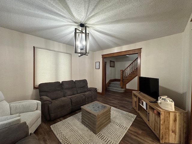 121 Park St, Luverne, MN 56156 - living room with dark wood-style flooring, stairs, and a textured ceiling
