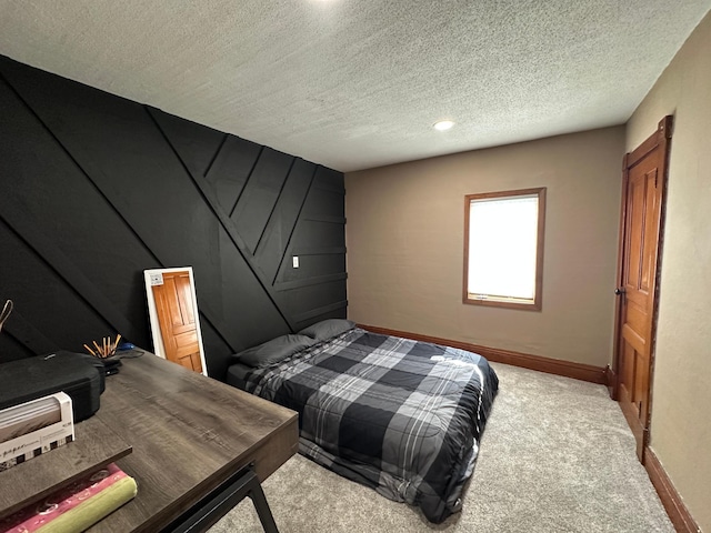 121 Park St, Luverne, MN 56156 - bedroom featuring light carpet and a textured ceiling
