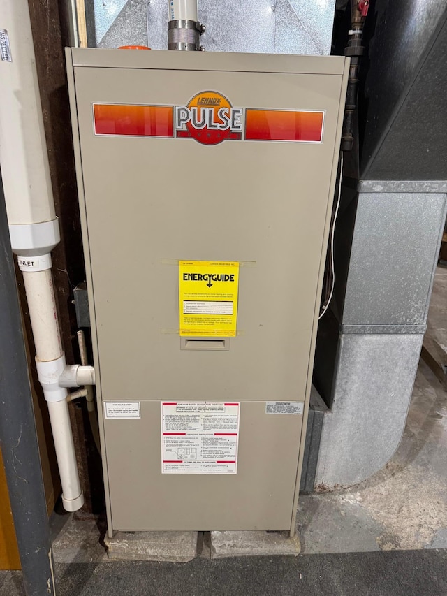 121 Park St, Luverne, MN 56156 - utility room with heating unit