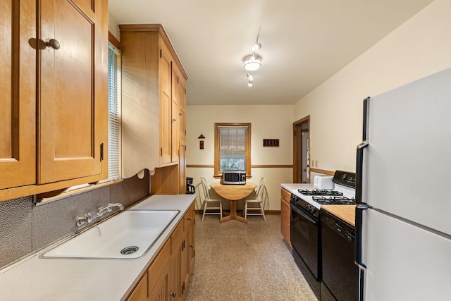 5924 10th Ave S, Minneapolis, MN 55417 - kitchen featuring black appliances and light countertops