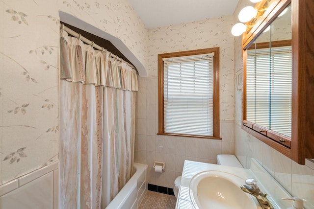 5924 10th Ave S, Minneapolis, MN 55417 - bathroom featuring wallpapered walls, vanity, shower / bath combo with shower curtain, and tile patterned flooring