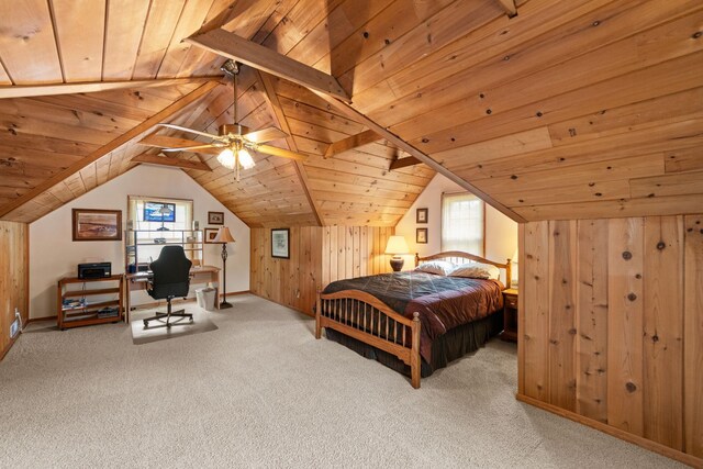 5924 10th Ave S, Minneapolis, MN 55417 - carpeted bedroom featuring wood ceiling, multiple windows, vaulted ceiling, wooden walls, and a desk