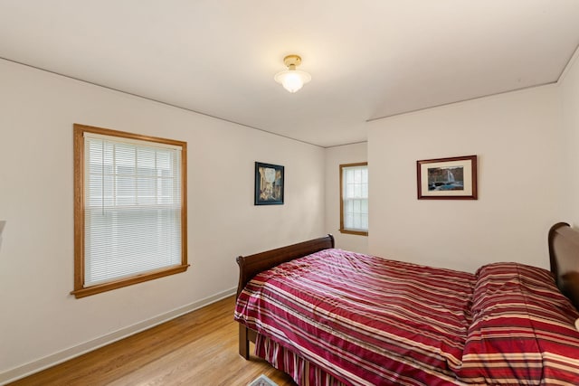 5924 10th Ave S, Minneapolis, MN 55417 - bedroom featuring light wood-type flooring and baseboards
