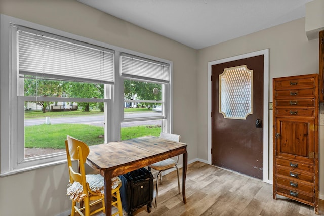 27900 Old Towne Rd, Chisago City, MN 55013 - dining room featuring baseboards and light wood finished floors