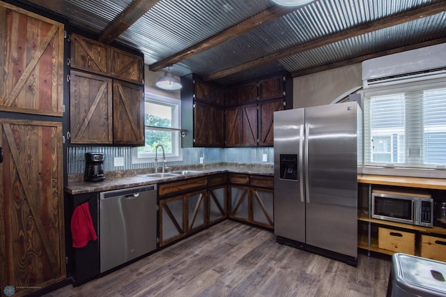 1514 1st Ave S, Fargo, ND 58103 - kitchen featuring stainless steel appliances, an AC wall unit, beam ceiling, dark wood-style flooring, and dark brown cabinets