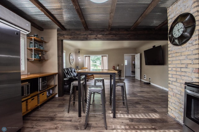 1514 1st Ave S, Fargo, ND 58103 - dining area featuring an AC wall unit, dark wood finished floors, and beam ceiling