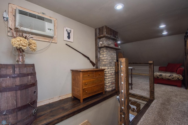 1514 1st Ave S, Fargo, ND 58103 - bedroom featuring an AC wall unit, recessed lighting, and carpet flooring