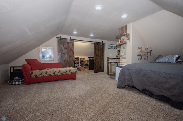 1514 1st Ave S, Fargo, ND 58103 - carpeted bedroom featuring lofted ceiling, a barn door, and recessed lighting