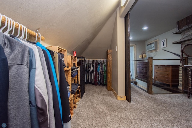 1514 1st Ave S, Fargo, ND 58103 - walk in closet with carpet, an AC wall unit, and lofted ceiling