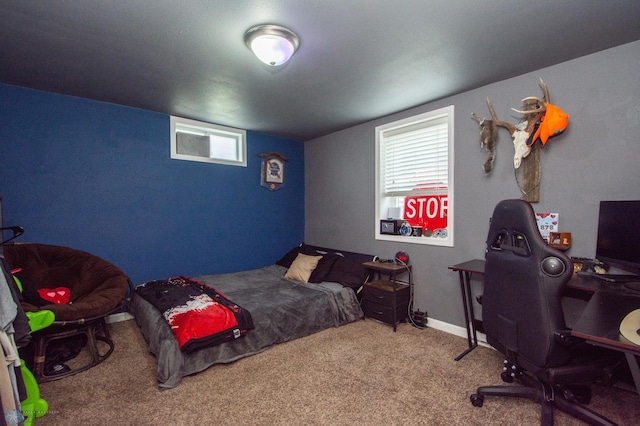 1514 1st Ave S, Fargo, ND 58103 - carpeted bedroom featuring multiple windows and a desk