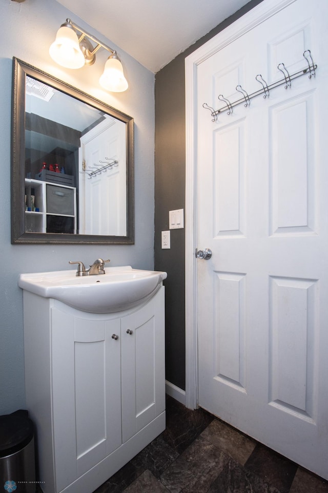 1514 1st Ave S, Fargo, ND 58103 - bathroom featuring vanity and baseboards