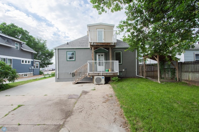 1514 1st Ave S, Fargo, ND 58103 - rear view of house featuring roof with shingles and stucco siding