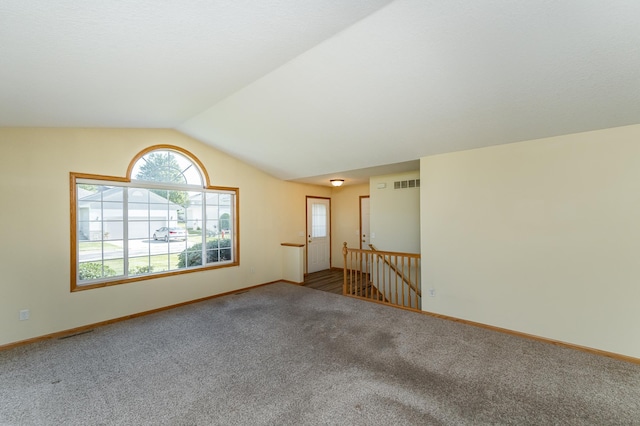 4540 Prairie View Pl NW, Rochester, MN 55901 - carpeted spare room featuring healthy amount of natural light and lofted ceiling