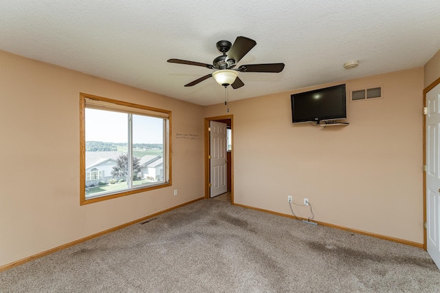 4540 Prairie View Pl NW, Rochester, MN 55901 - carpeted spare room featuring a ceiling fan and a smoke detector