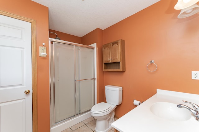 4540 Prairie View Pl NW, Rochester, MN 55901 - bathroom featuring a stall shower, tile patterned floors, vanity, and a textured ceiling