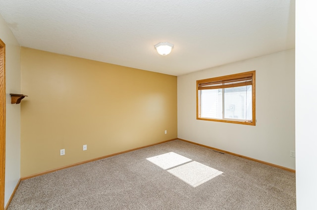 4540 Prairie View Pl NW, Rochester, MN 55901 - empty room featuring carpet floors and baseboards