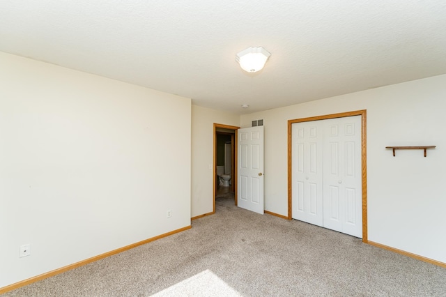4540 Prairie View Pl NW, Rochester, MN 55901 - unfurnished bedroom with light colored carpet and a closet